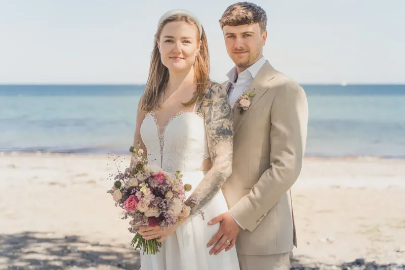 Bride and groom on a Baltic beach