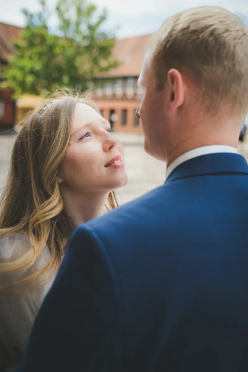 Bride looking up at her groom
